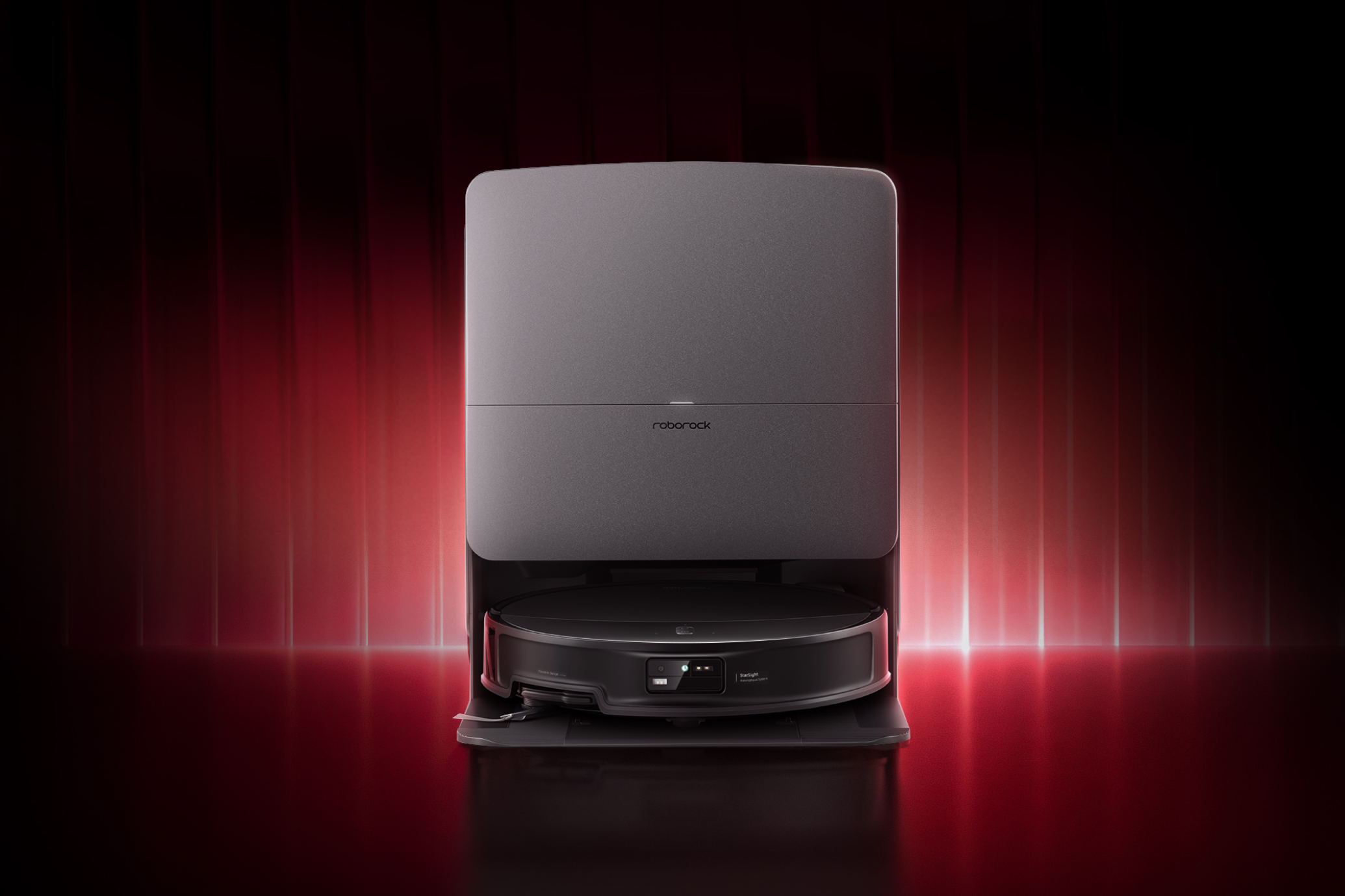 Promotional graphic for Roborock Saros 20. On the left, a black robot vacuum is docked in its base station. The text on the right introduces the Brand New RockDock, featuring 100°C hot water mop washing, dock self-cleaning, and fresh-air dust bag drying.